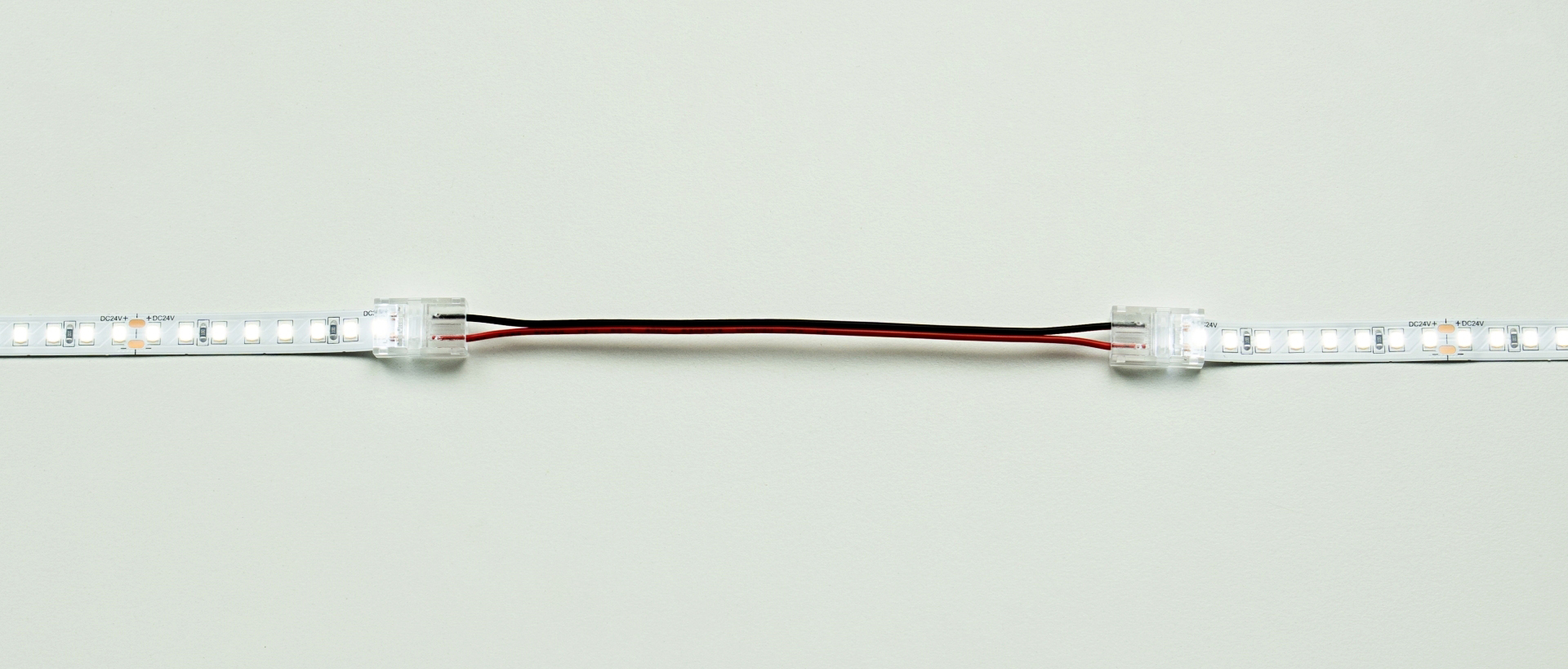 Connection diagram of LED strips using a double-sided connector with a cable